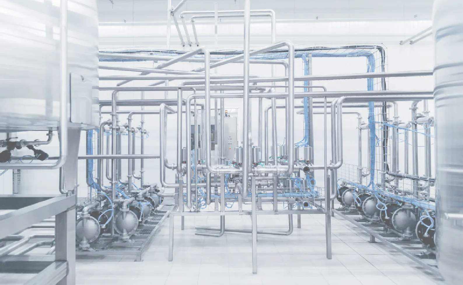 AJS UHP TUBE — Cleanroom piping installation pictured in the AJS UHP catalog. Ultra high purity tubing for semiconductor and pharmaceutical cleanrooms
