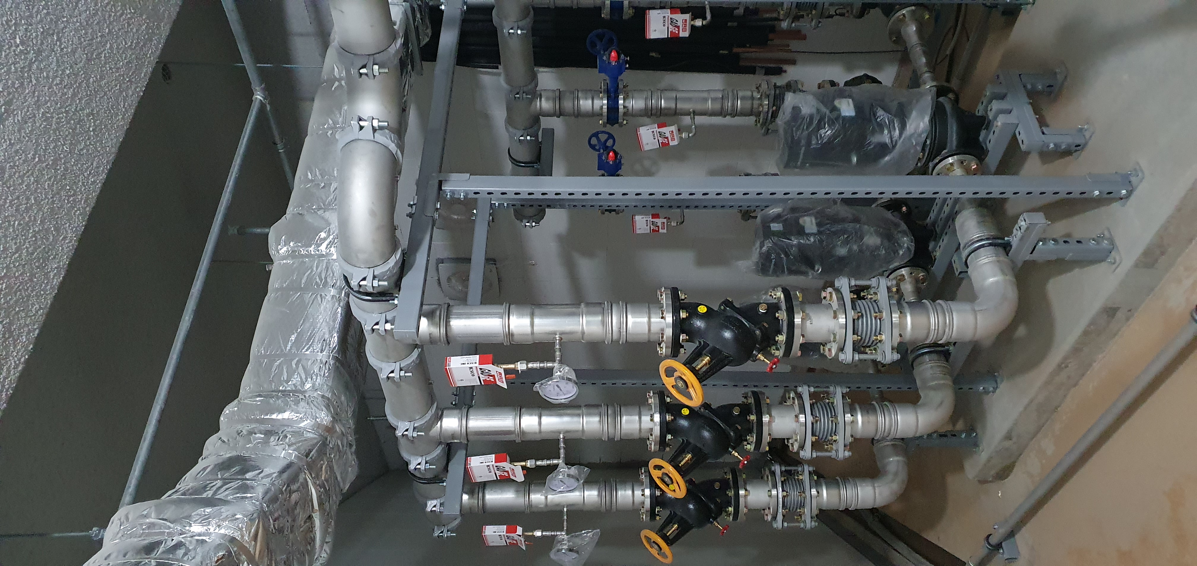 Sinnae commercial facility · mechanical-room piping